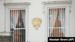 Britain -- Barred windows with the crest of the Russian Federation at the Russian Embassy in Kensington, London, March 14, 2018