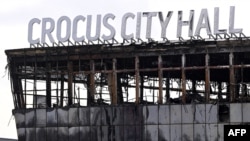 A view shows the burnt-out Crocus City Hall concert venue in Krasnogorsk, outside Moscow, on March 26, 2024. (NATALIA KOLESNIKOVA /AFP)