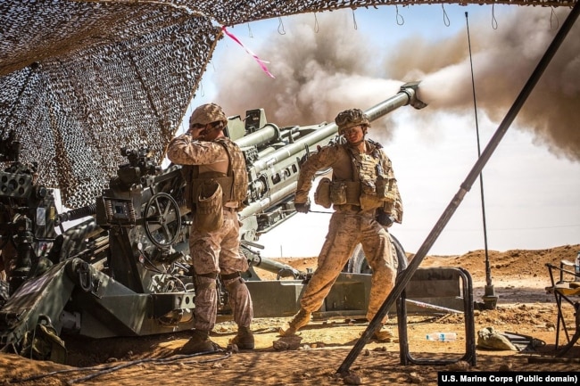 SYRIA - U.S. Marines with the 11th Marine Expeditionary Unit fire an M777 Howitzer during a fire mission in northern Syria as part of Operation Inherent Resolve, Mar. 24, 2017.
