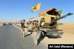 IRAQ -- Shiite Popular Mobilization Forces (PMF) are seen in Zumar, Nineveh province, October 18, 2017