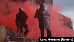 Police officers during a protest in Bogota, on May 5, 2021.