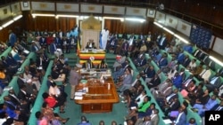 The Ugandan Parliament votes on a harsh new anti-gay bill, on Tuesday, March 21, 2023. (AP/Ronald Kabuubi)