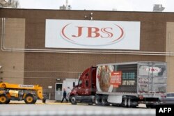The JBS meat placing plant is viewed in Plainwell, Michigan on June 2, 2021. An American subsidiary of Brazilian meat processor JBS told the U.S. government that it has received a ransom demand in a cyberattack it believes originated in Russia.