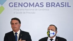 President Jair Bolsonaro and Brazilian Health Minister Eduardo Pazuello attend a ceremony to launch the Genomas Project at Planalto Palace in Brasilia, on October 14, 2020.