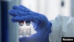 A handout photo shows samples of a vaccine against COVID-19 developed by the Gamaleya Research Institute of Epidemiology and Microbiology, in Moscow, Russia August 6, 2020. The Russian Direct Investment Fund (RDIF)/Handout via REUTERS.