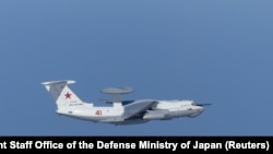 JAPAN -- A Russian A-50 military aircraft flies near the disputed islands called Takeshima in Japan and Dokdo in South Korea, in this handout picture taken by Japan Air Self-Defense Force and released by the Joint Staff Office of the Defense Ministry of Japan
