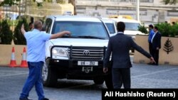 SYRIA -- The United Nation vehicles carrying the Organization for the Prohibition of Chemical Weapons (OPCW) inspectors arrive in Damascus, April 14, 2018