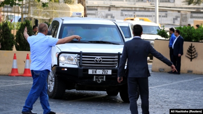 SYRIA -- The United Nation vehicles carrying the Organization for the Prohibition of Chemical Weapons (OPCW) inspectors arrive in Damascus, April 14, 2018