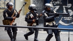 National Police members during clashes in an anti-government protest in Caracas, on March 22, 2014.