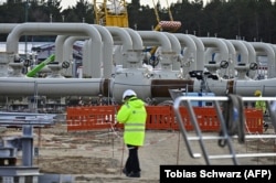 GERMANY -- Men work at the construction site of the so-called Nord Stream 2 gas pipeline in Lubmin, March 26, 2019