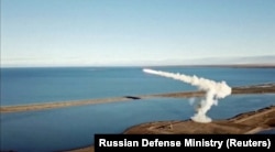 A still image taken from a video footage and released by Russian Defence Ministry, shows the launch by Bastion coastal defence system of a supersonic anti-ship Oniks missile during tactical drills by North Navy Fleet at Kotelny Island in Laptev