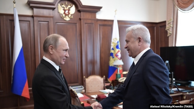 RUSSIA -- Russian President Vladimir Putin (L) meets with CEO of Lukoil company Vagit Alekperov at the Kremlin in Moscow, April 16, 2019