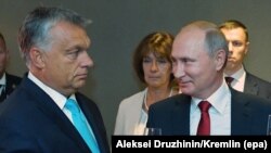 HUNGARY -- Hungarian Prime Minister Viktor Orban (L) and Russian President Vladimir Putin attend the opening ceremony of the 2017 World Judo Championships at the Papp Laszlo Budapest Sports Arena in Budapest, August 28, 2017