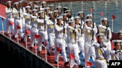 Sailors of the Russian Black Sea Fleet take part in the Navy Day celebrations in the Crimean city of Sevastopol on July 26, 2015.