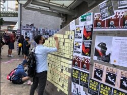 Hong Kong protesters rebuild "Lennon Walls" ahead of China National Day.