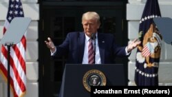 U.S. President Donald Trump touts administration efforts to curb federal regulations during an event on the South Lawn of the White House in Washington, U.S., July 16, 2020.