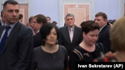 RUSSIA -- Members of Jehovah's Witnesses react in a courtroom after judge's decision in Moscow, April 20, 2017.