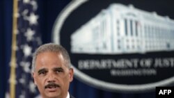 U.S. - U.S. Attorney General Eric Holder speaks during a news conference at the Justice Department May 19, 2014 in Washington, DC