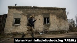 Ukraine -- The Ukrainian soldier explains the dangerous shelling zones inside inside the industrial zone ("Promka", "Promzone") near city Avdiivka, December 4, 2017