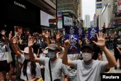 Anti-government protesters march again Beijing's plans to impose national security legislation in Hong Kong