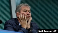 U.K. -- Chelsea soccer club owner Roman Abramovich sits in his box before the English Premier League soccer match between Chelsea and Sunderland at Stamford Bridge stadium in London, December 19, 2015