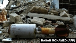 Syria - empty rocket reportedly fired by regime forces on the rebel-held besieged town of Douma