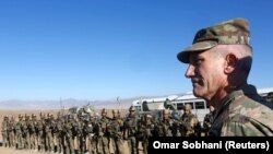 U.S. Army Gen. John W. Nicholson, the commander of NATO and U.S. forces in Afghanistan, speaks with Afghan police special forces, Logar province, November 30, 2017.