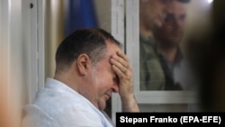 Borys Herman, who according to Ukrainian authorities is suspected in a plot to murder Russian dissident Arkady Babchenko, attends a court hearing in Kyiv, May 31, 2018
