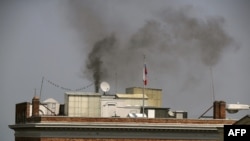 SAN FRANCISCO, CA - Black smoke billows from a chimney on top of the Russian consulate on September 1, 2017 in San Francisco, California.