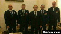 Vladimir Putin (center) pictured with Dmitry "Wagner" Utkin (first on the right) in the Kremlin. Dec. 9, 2016