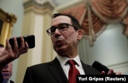 U.S. Treasury Secretary Steve Mnuchin speaks to reporters after it was reported House Majority Leader Steny Hoyer (D-MD) would ask the Treasury Department to delay the lifting of sanctions on two companies tied to Russian oligarch Oleg Deripaska.