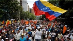 People participate in a demonstration in Caracas, Venezuela March 10, 2020. REUTERS/Manaure Quintero.