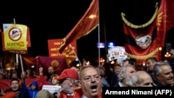MACEDONIA -- Supporters of a boycott for the name-change referendum celebrate in front of the Parliament in Skopje, September 30, 2018