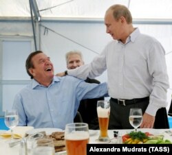 RUSSIA – Vladimir Putin and Gerhard Schroeder, city of Vyborg, Sept. 6, 2011.