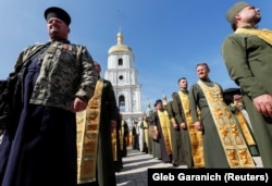 UKRAINE – Military chaplains of Orthodox Church of Ukraine take part in a ceremony marking the 1031st anniversary of the Christianization of the Kyivan Rus, in Kyiv, July 28, 2019