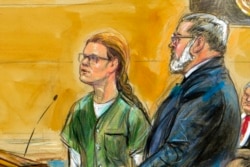 In this courtroom sketch, Maria Butina, left, is shown next to her attorney Robert Driscoll, before U.S. District Judge Tanya Chutkan, during a court hearing at the U.S. District Court in Washington, D.C., on December 13, 2018. ( Dana Verkouteren/Associated Press)