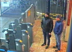 The two Russian men identified by British investigation as suspects in Skripal Poisoning appear in a video recorded by the security cameras in Salisbury metro station.