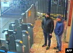 The two Russian men identified by British investigation as suspects in Skripal Poisoning appear in a video recorded by the security cameras in Salisbury metro station.