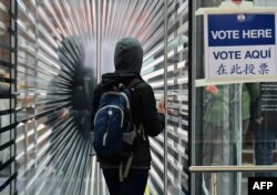 NEW YORK – Voters arrive to cast their early ballot for the 2020 Presidential election at the Brooklyn Museum in New York City on October 30, 2020.