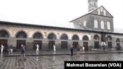 Workers disinfecting a mosque in Turkey