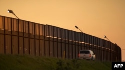 U.S. - A border patrol agent drives along the US- Mexico border crossing on January 26, 2017 in San Ysidro, California.