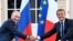 FRANCE -- French President Emmanuel Macron shakes hands with Russia's President Vladimir Putin, at his summer retreat of the Bregancon fortress on the Mediterranean coast, near the village of Bormes-les-Mimosas, August 19, 2019