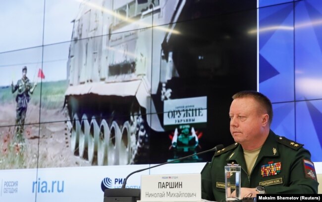 RUSSIA -- Head of the Main Missile and Artillery Directorate of the Russian Defence Ministry Lieutenant-General Nikolai Parshin attends a news conference on the crash of the Malaysia Airlines Boeing 777 plane operating flight MH17 downed in eastern Ukrain