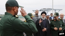 Iranian President Ebrahim Raisi (C-R) visiting the Iranian revolutionary guards corps (IRGC) navy base in Bandar Abbas on February 2, 2024.
A handout picture made available by the Iranian presidential office on February 2, 2024. (Iranian presidential office/via AFP)
