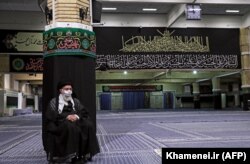 IRAN -- Iranian Supreme Leader Ayatollah Ali Khamenei, listens to a Koran recital at the empty mosque in his residence compound during the holy month of Muharram, in the capital Tehran, August 27, 2020.