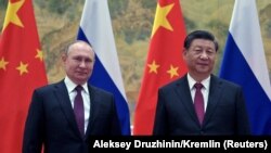 Russian President Vladimir Putin attends a meeting with Chinese President Xi Jinping in Beijing, China February 4, 2022. (Aleksey Druzhinin/Sputnik/Kremlin via REUTERS)