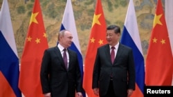 Russian President Vladimir Putin attends a meeting with Chinese President Xi Jinping in Beijing, China February 4, 2022. (Aleksey Druzhinin/Kremlin via REUTERS)