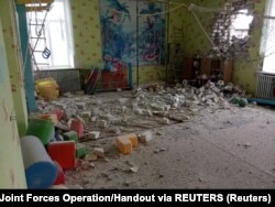 Interior view of a kindergarten in Stanytsia Luhanska in Ukrainian government-held territory after it was hit by an artillery shell on February 17. There were only minor injuries.