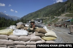 An Indian paramilitary soldiers on guard at a check post some 81 kilometers from Srinagar along a highway leading to Ladakh, where the Galwan Valley is located, on June 17, 2020.