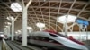 High-speed train is parked during the opening ceremony for launching Southeast Asia's first high-speed railway at Halim station in Jakarta, Indonesia, Monday, Oct. 2, 2023.(AP/Achmad Ibrahim)